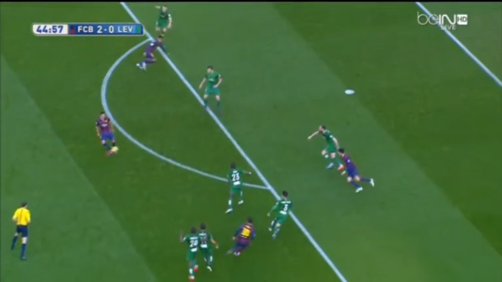 A combination that ends with a 1-2 between Messi and Xavi. Note the amount of defenders Messi's draws out of position before Xavi chips the ball through.